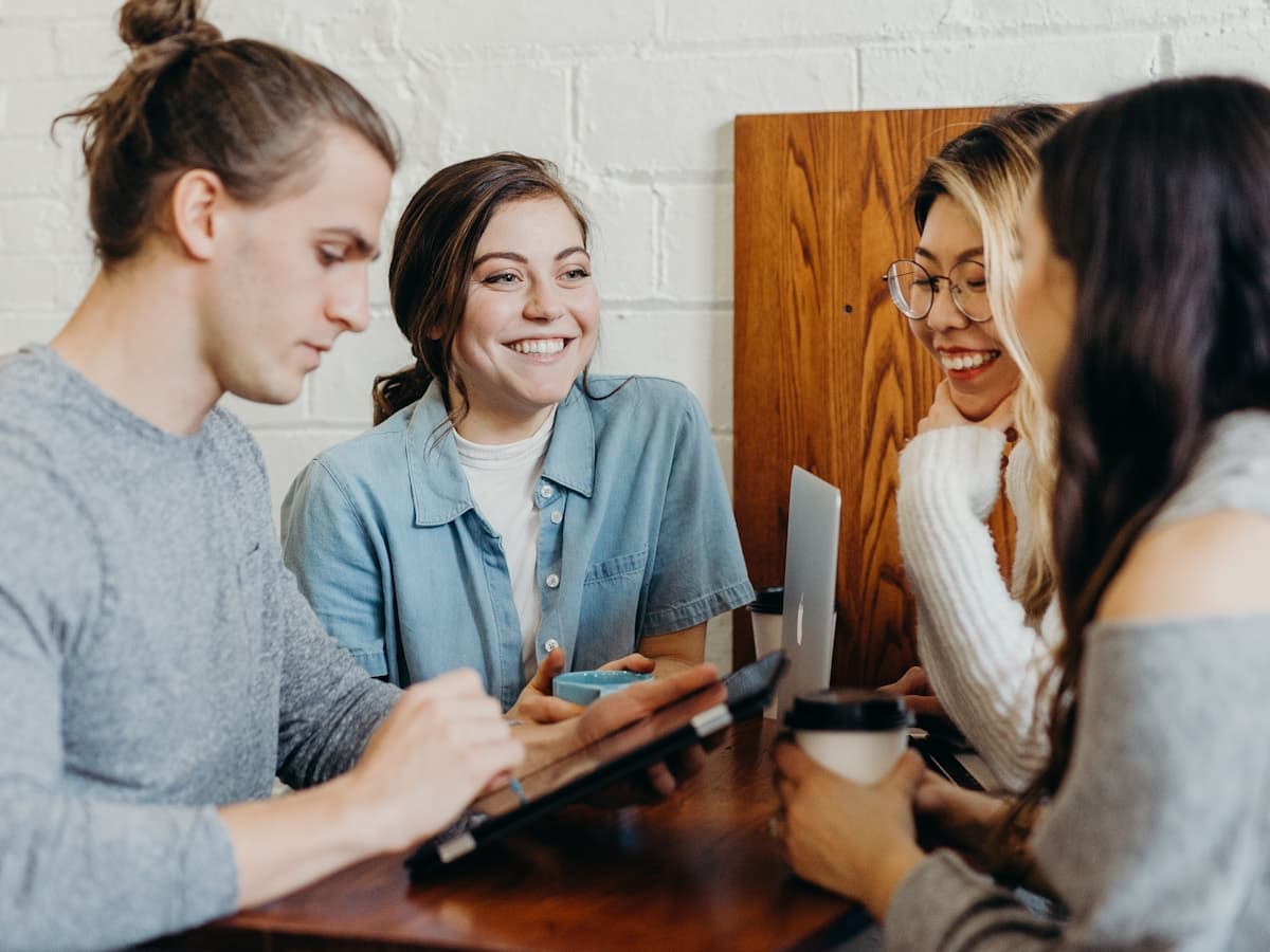 Business owners reviewing a photo and video plan together
